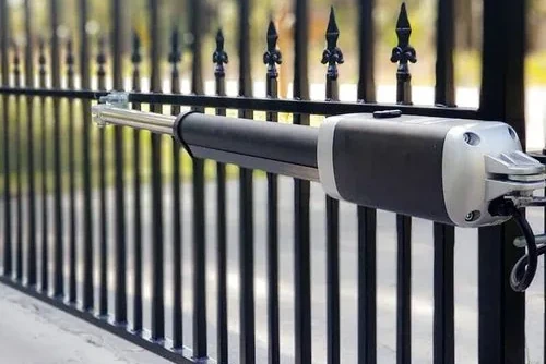 Single arm gate opener on a wrought iron swing gate