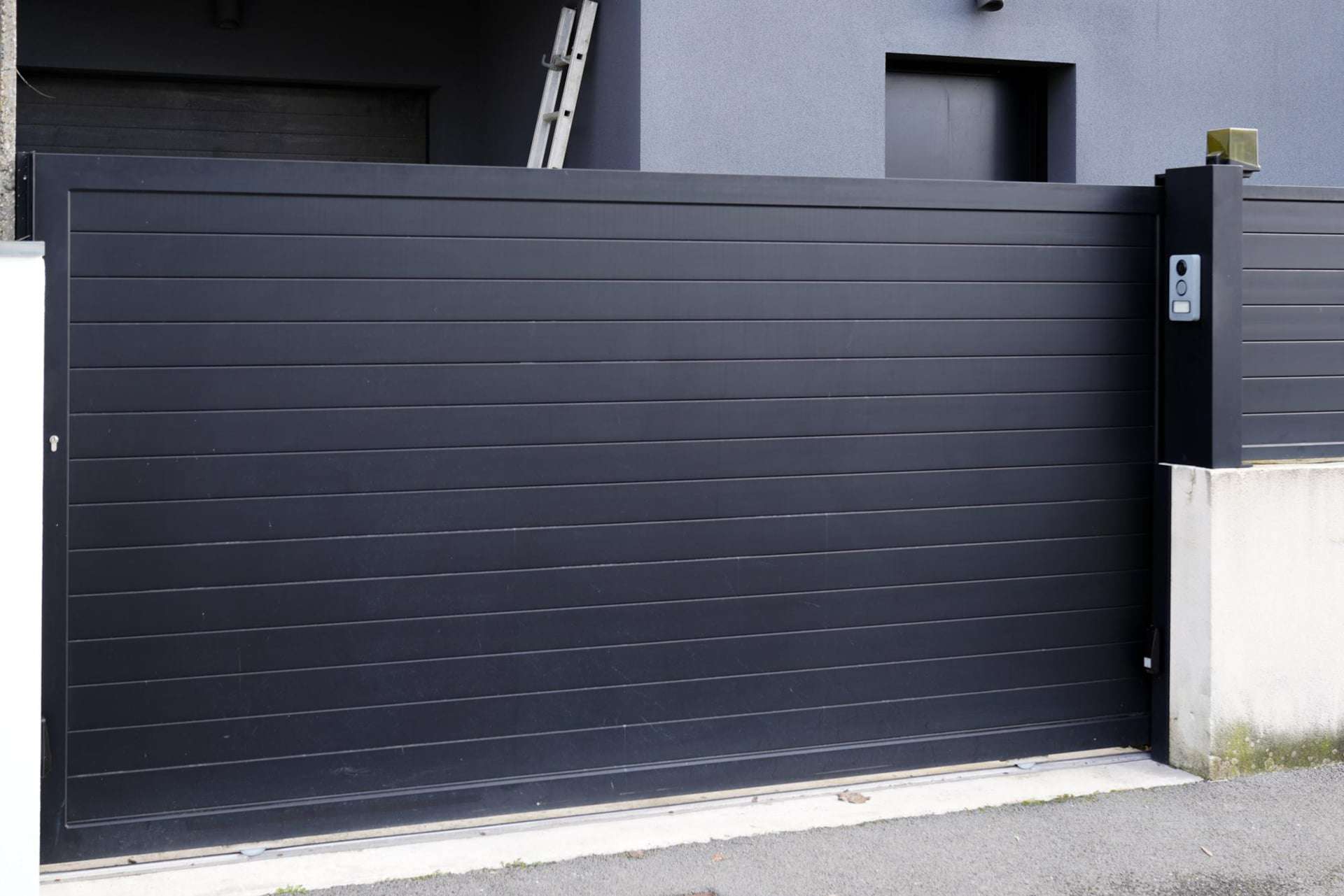 Dark blue automatic gate installation