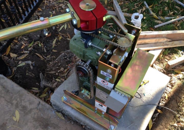 A gate motor being serviced