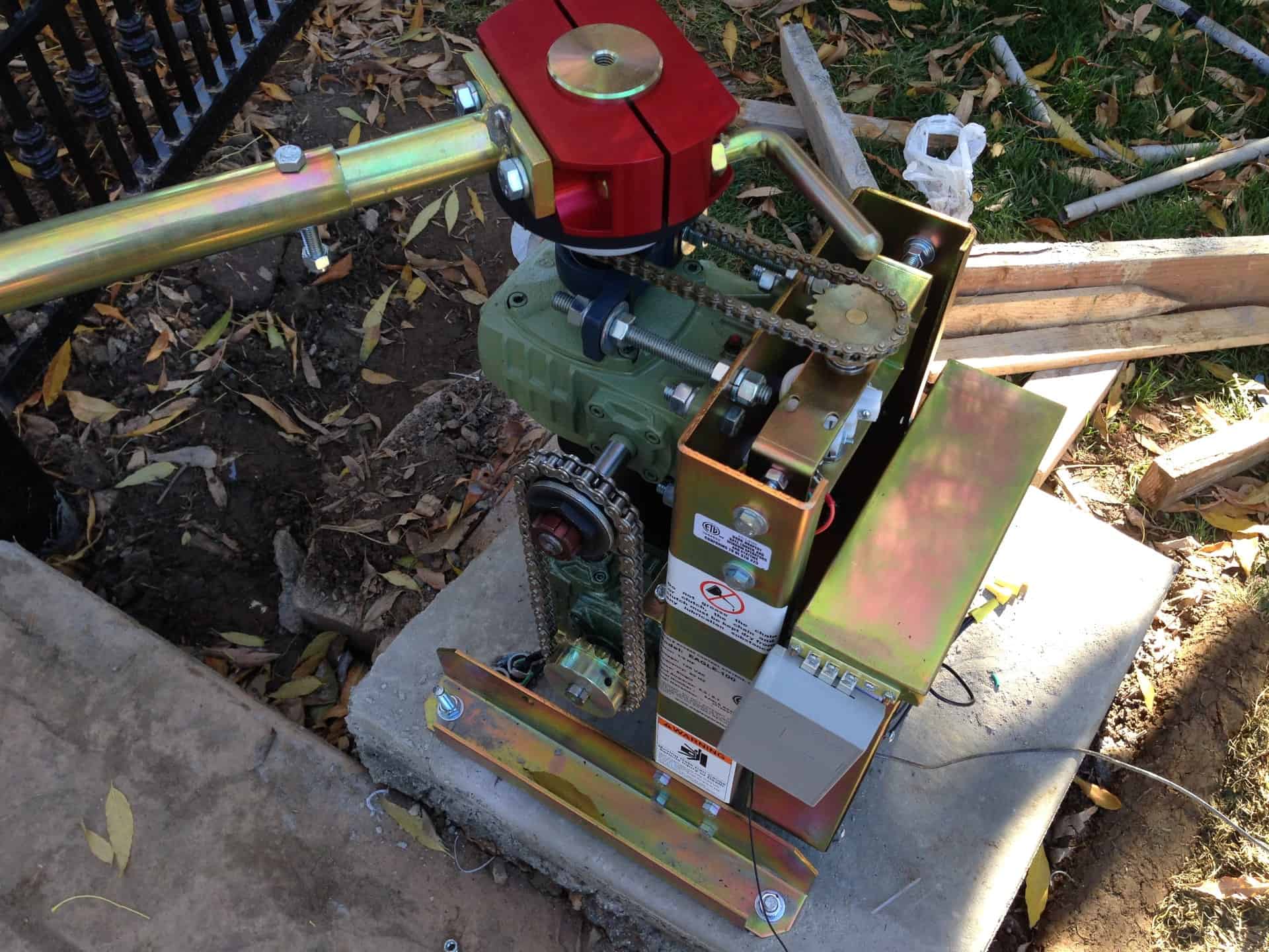 A gate motor being serviced